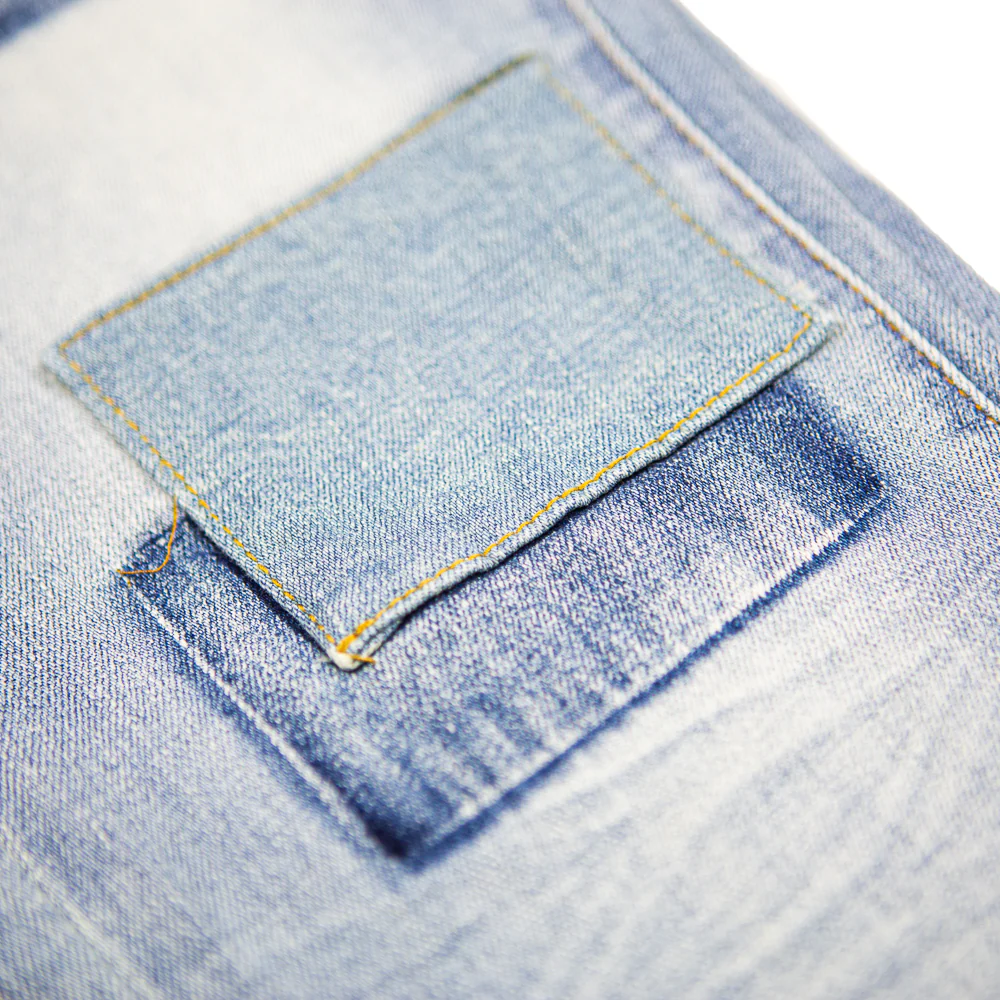 The McQueen Slim-Fit Denim Jean (Patched Up Indigo) - Image 4